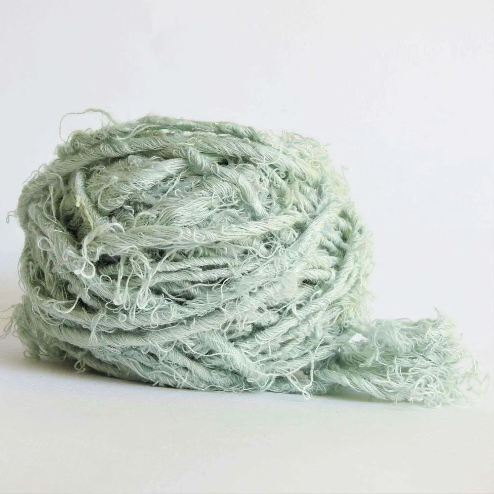 
                  
                    Ball of chunky yarn in Sage. A thick yarn hand crafted from recycled linen material. A recycled yarn for blankets, macrame, scarves, hats, bags. Sustainable eco friendly vegan yarn. Sustainable yarn australia.
                  
                