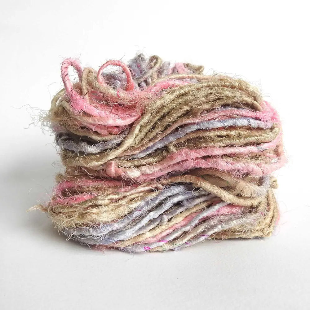 
                  
                    Ball of Sari Silk Yarn in Candy Swirl. Recycled sari silk yarn Australia. Eco friendly yarn. Handspun, chunky yarn for knitting, crochet, weaving, craft.
                  
                