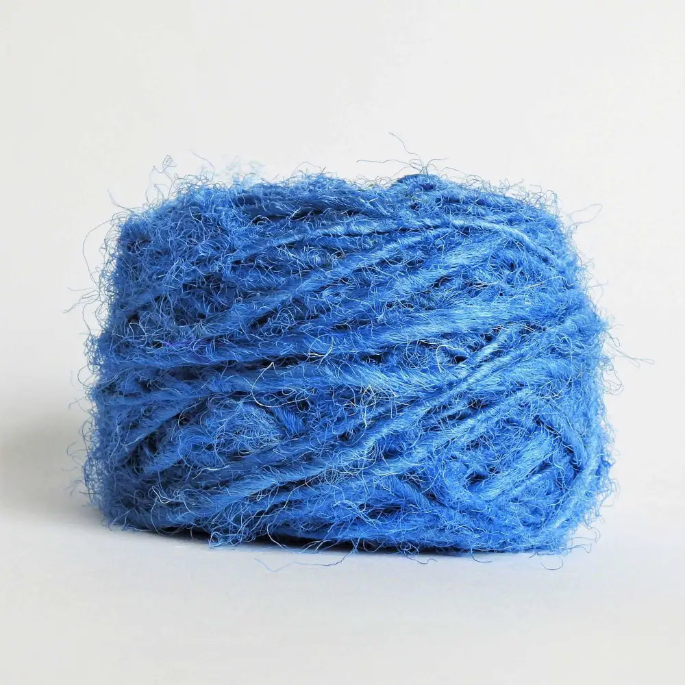 
                  
                    Ball of Sari Silk Yarn in Dazzling Blue. Recycled sari silk yarn Australia. Eco friendly yarn. Handspun, chunky yarn for knitting, crochet, weaving, craft.
                  
                