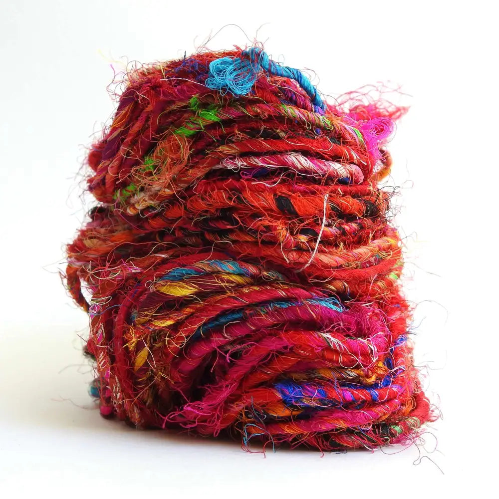
                  
                    Ball of Sari Silk Yarn in Fiesta. Recycled sari silk yarn Australia. Eco friendly yarn. Handspun, chunky yarn for knitting, crochet, weaving, craft.
                  
                