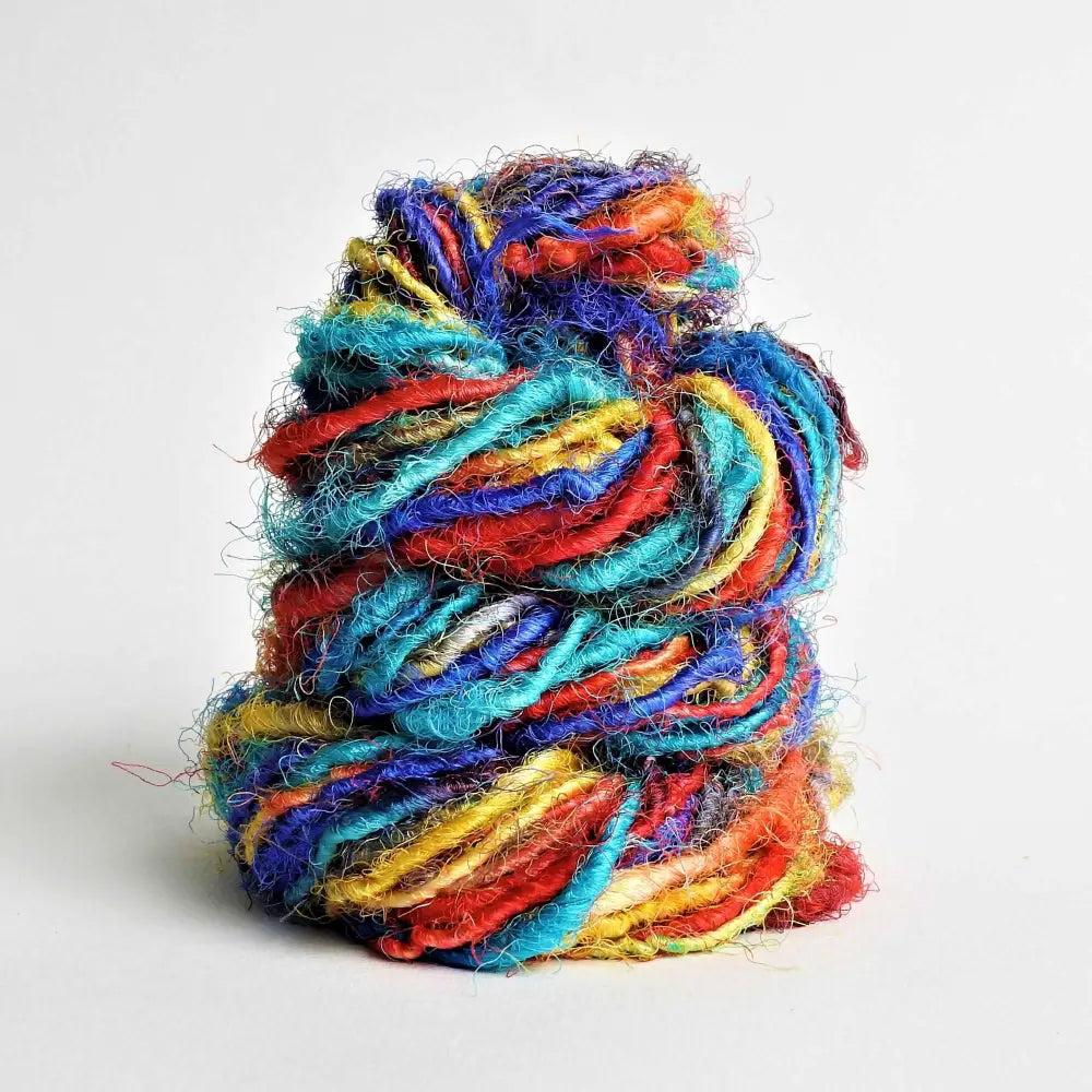 
                  
                    Ball of Sari Silk Yarn in Rainbow. Recycled sari silk yarn Australia. Eco friendly yarn. Handspun, chunky yarn for knitting, crochet, weaving, craft.
                  
                