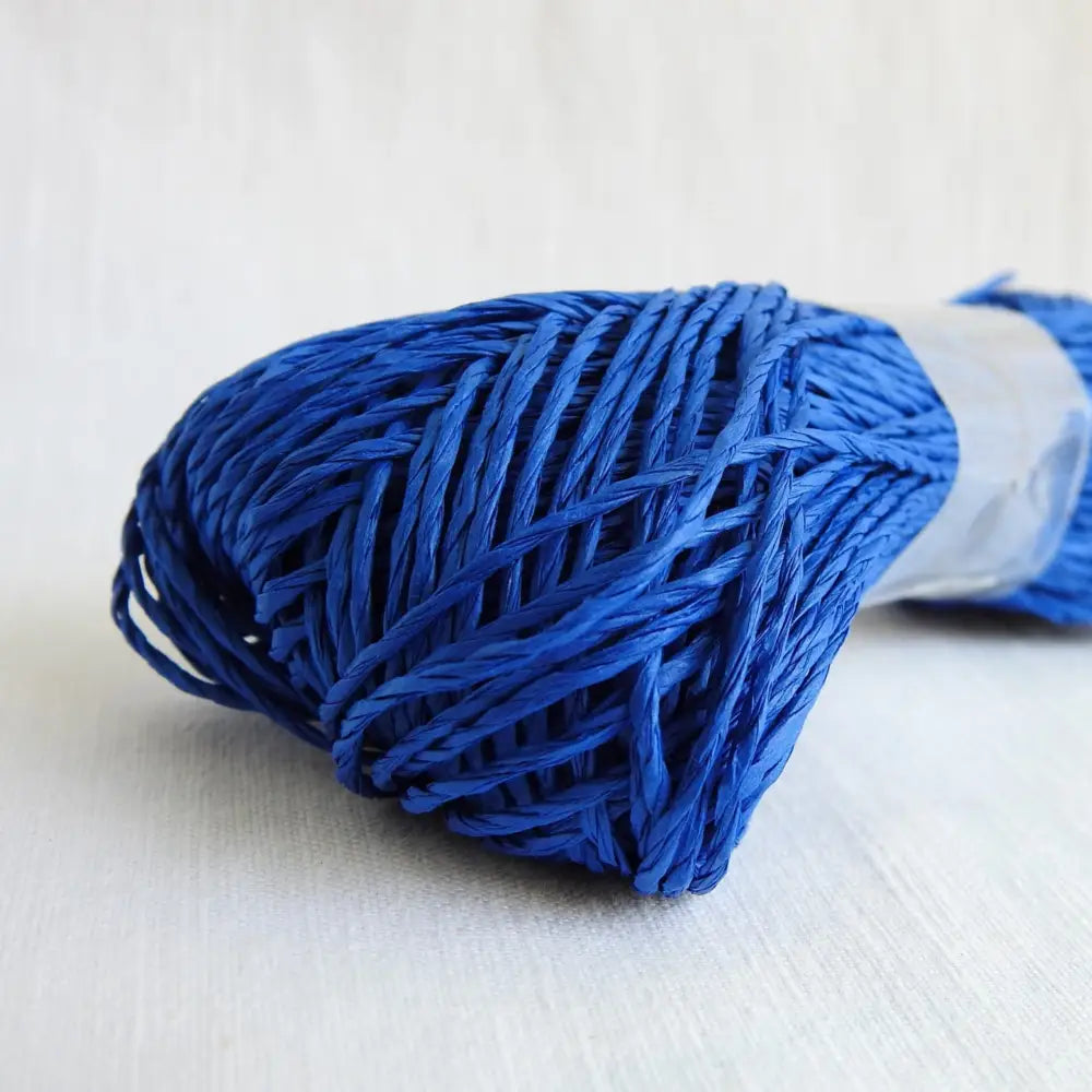 
                  
                    Skein of Sasawashi Bamboo Paper yarn in #15 blue. Daruma Bamboo yarn for summer hats, bags, baskets. Eco friendly, vegan yarn for weaving, knitting, crochet, craft. Daruma Ito Yokota Sasawashi.
                  
                