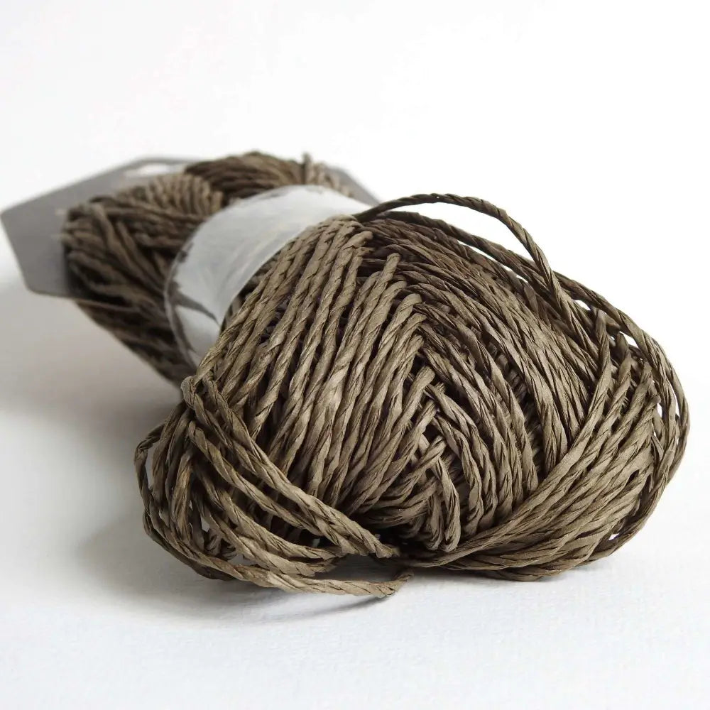 
                  
                    Skein of Sasawashi Bamboo Paper yarn in #6 Olive. Daruma Bamboo yarn for summer hats, bags, baskets. Eco friendly, vegan yarn for weaving, knitting, crochet, craft. Daruma Ito Yokota Sasawashi.
                  
                