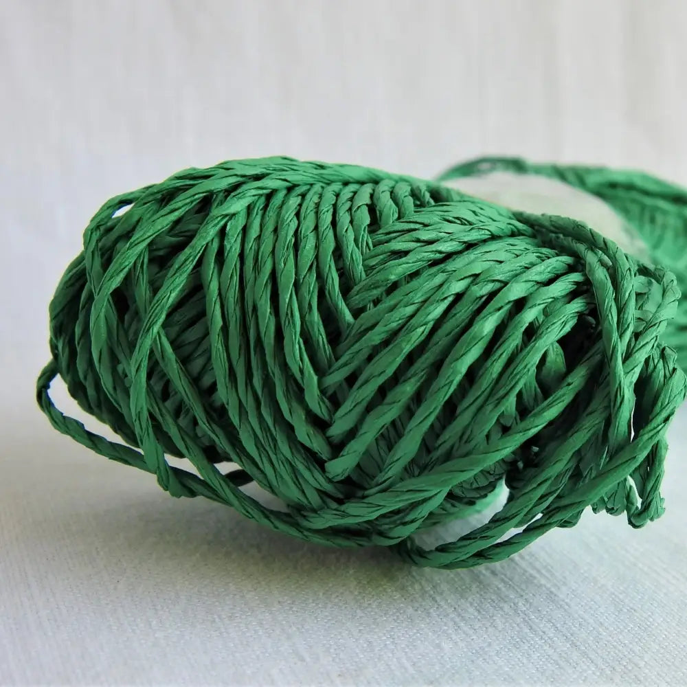 
                  
                    Skein of Sasawashi Bamboo Paper yarn in #14 green. Daruma Bamboo yarn for summer hats, bags, baskets. Eco friendly, vegan yarn for weaving, knitting, crochet, craft. Daruma Ito Yokota Sasawashi.
                  
                