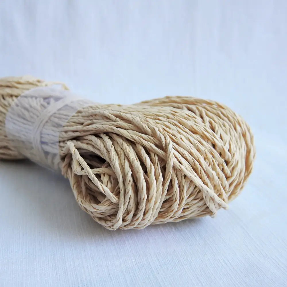 
                  
                    Skein of Sasawashi Bamboo Paper yarn in #1 natural. Daruma Bamboo yarn for summer hats, bags, baskets. Eco friendly, vegan yarn for weaving, knitting, crochet, craft. Daruma Ito Yokota Sasawashi.
                  
                