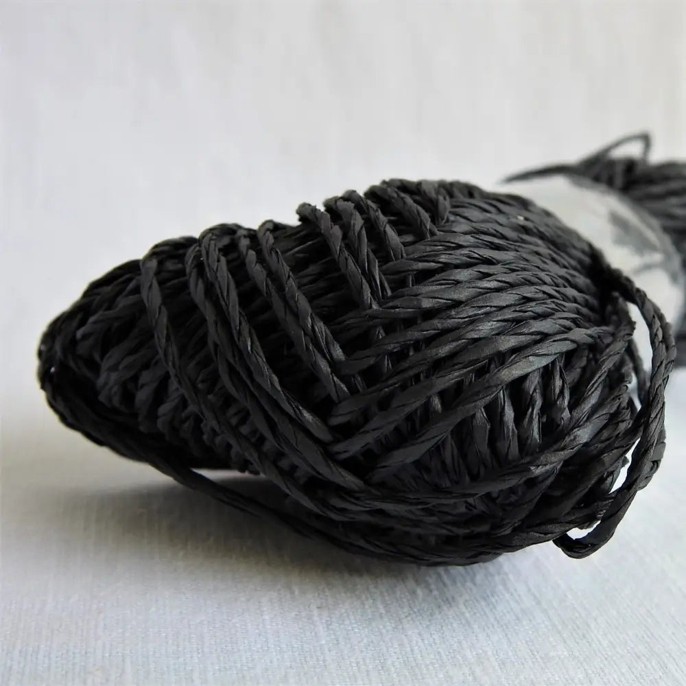 
                  
                    Skein of Sasawashi Bamboo Paper yarn in #17 sumi. Daruma Bamboo yarn for summer hats, bags, baskets. Eco friendly, vegan yarn for weaving, knitting, crochet, craft. Daruma Ito Yokota Sasawashi.
                  
                