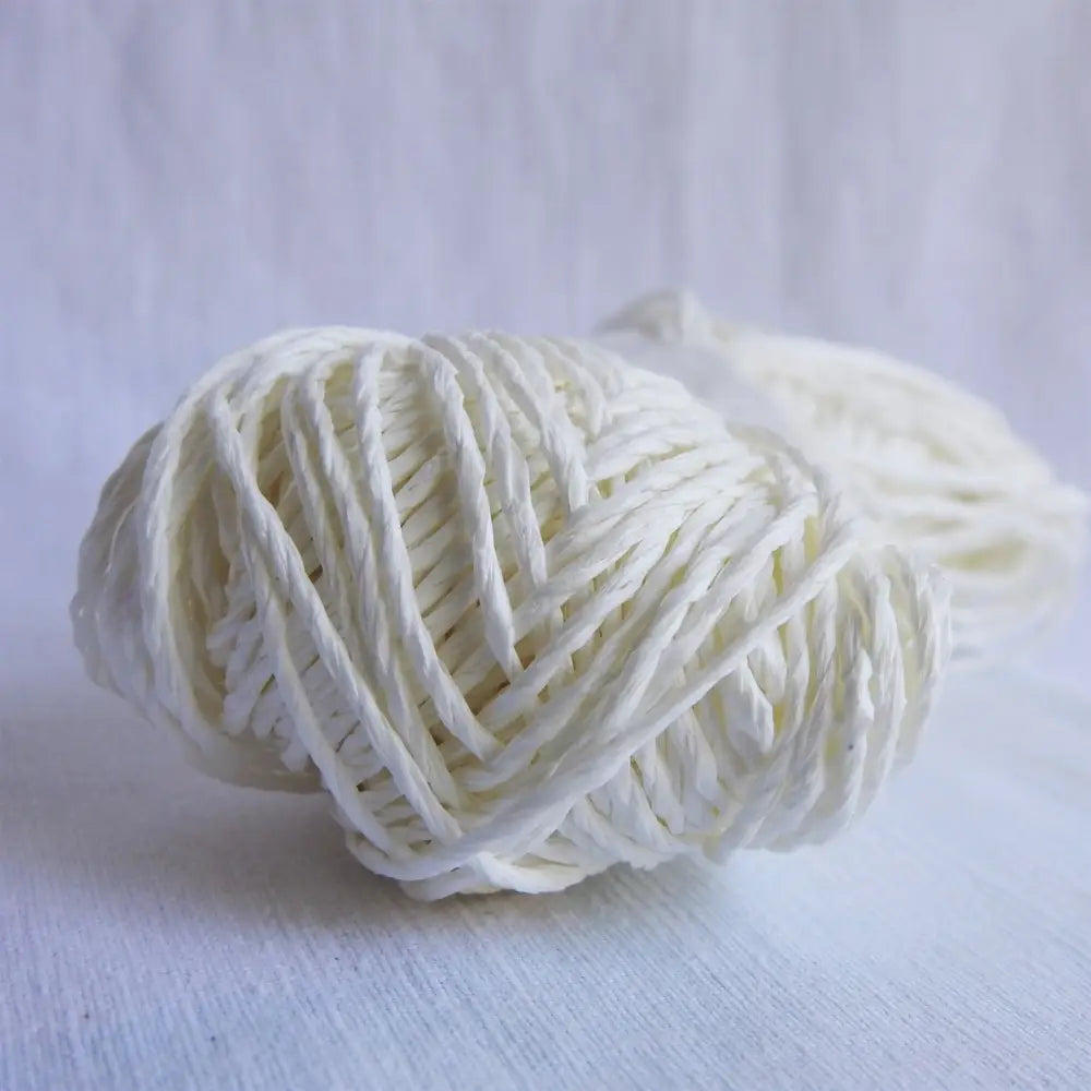 
                  
                    Skein of Sasawashi Bamboo Paper yarn in #12 white. Daruma Bamboo yarn for summer hats, bags, baskets. Eco friendly, vegan yarn for weaving, knitting, crochet, craft. Daruma Ito Yokota Sasawashi.
                  
                