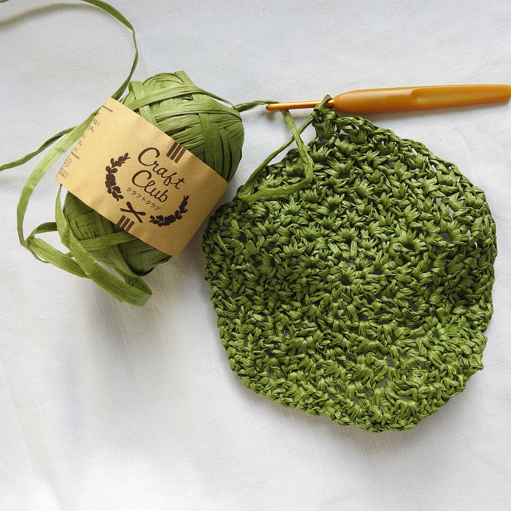 
                  
                    Sample circle crocheted using Raffia yarn in Green crafted by @orafabulousfibres. Natural soft raffia for baskets, hats, bags and mats. Hat crocheted using Daruma Raffia Ribbon in Green. Vegan, eco friendly coloured raffia ribbon. Dyed raffia for hats, baskets, bags
                  
                