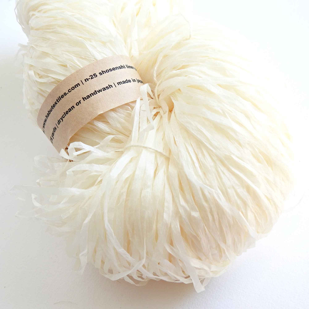 Skein of Shosenshi Linen paper yarn in White. For Weaving, Knitting, Crochet. 100% Linen with a delicate viscose sizing. Habu Textiles Shosenshi Linen Paper N-25