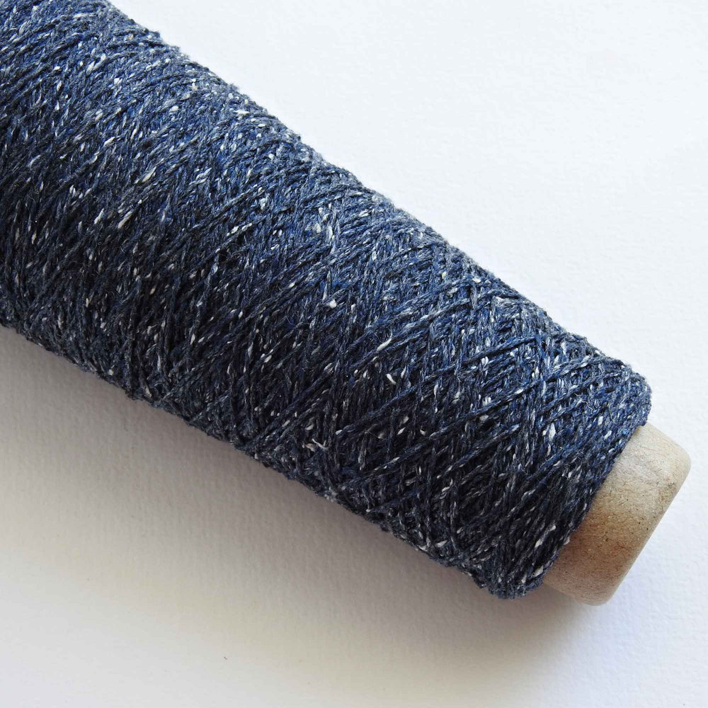 
                  
                    Habu Tsumugi Silk Yarn in #7 Jean Blue. Japanese Slub Silk on cone for weaving, knitting and crochet. Create beautiful, soft garments, jewelry, bags, scarves, shawls and wraps. Lace yarn with texture. Habu Textiles A-1
                  
                