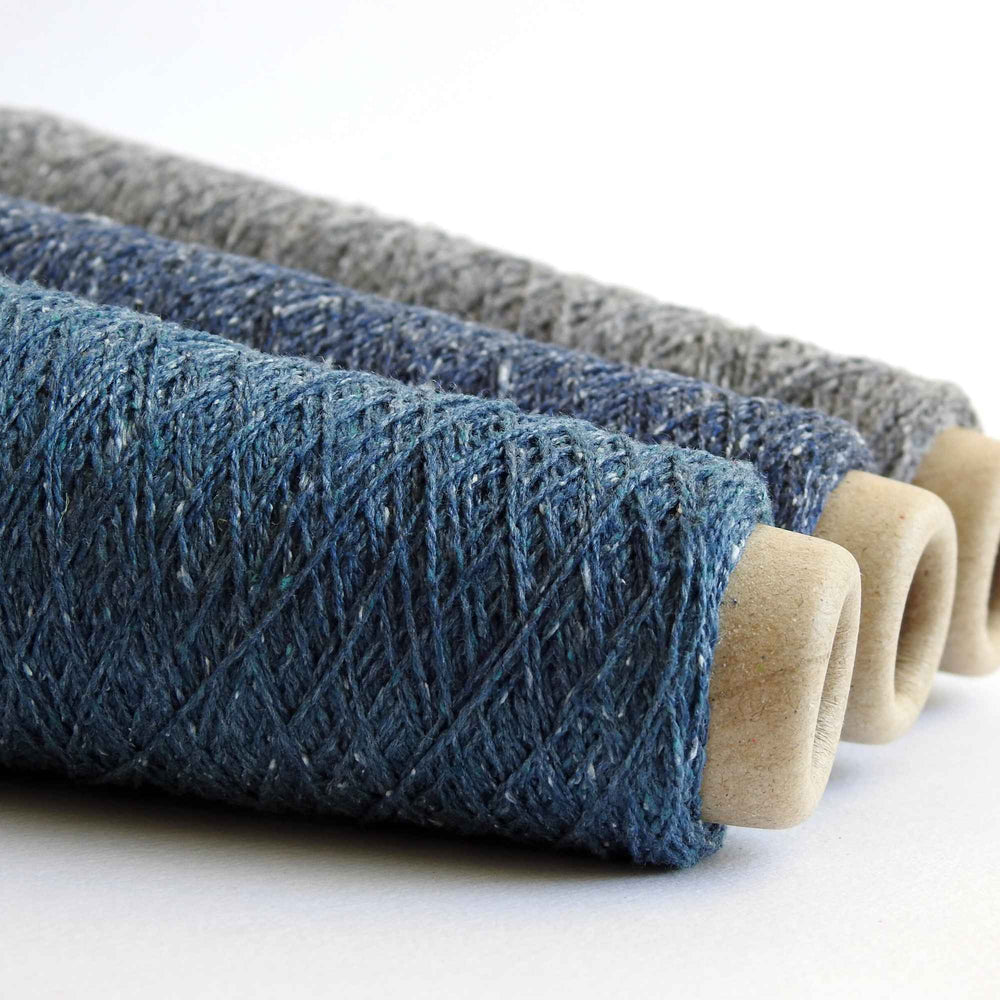 Habu Tsumugi Silk Yarn in blues and greys. Japanese Slub Silk on cone for weaving, knitting and crochet. Create beautiful, soft garments, jewelry, bags, scarves, shawls and wraps. Lace yarn with texture. Habu Textiles A-1