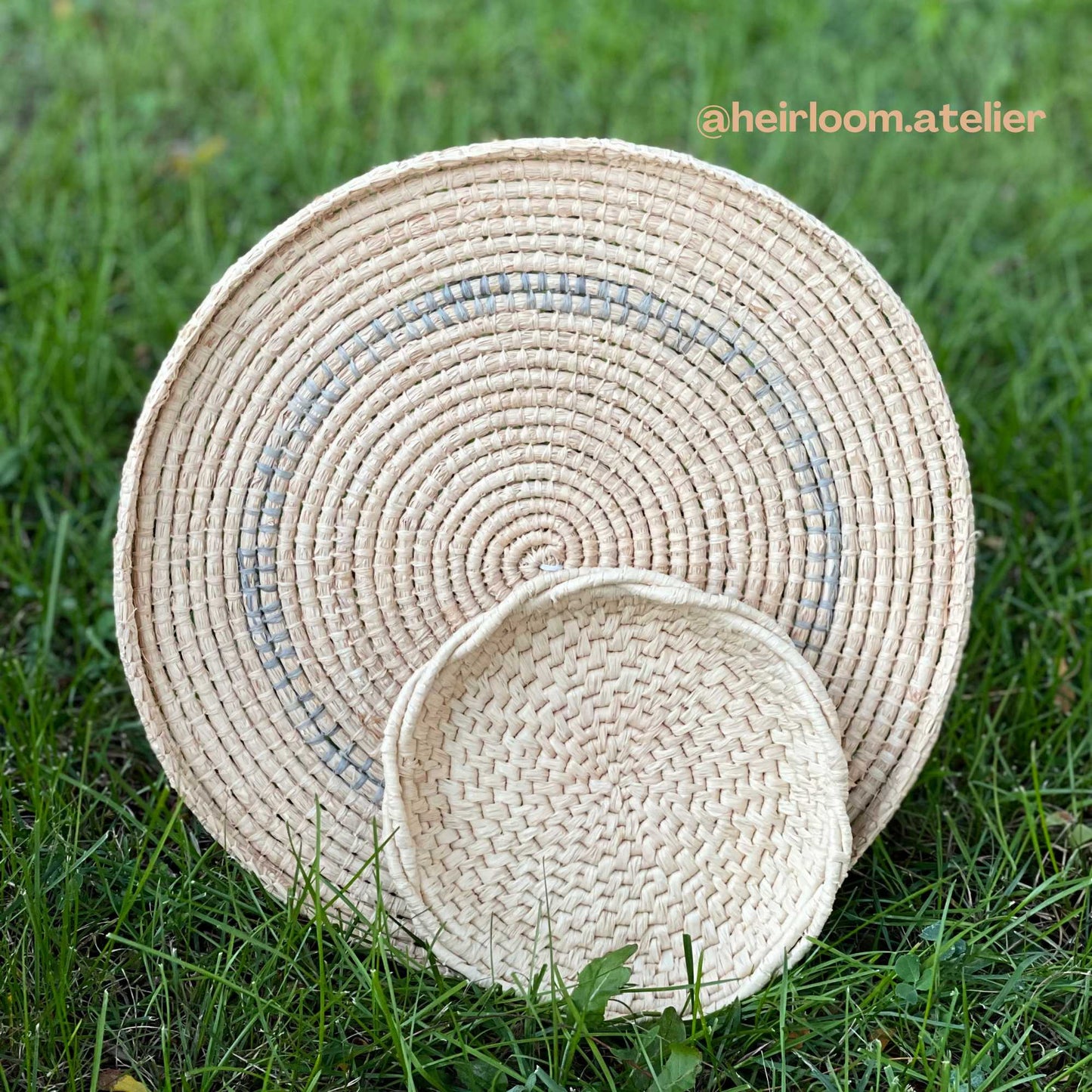 
                  
                    Raffia platter and basked crafted using Nutscene raffia in natural by @heirloom.atelier
                  
                