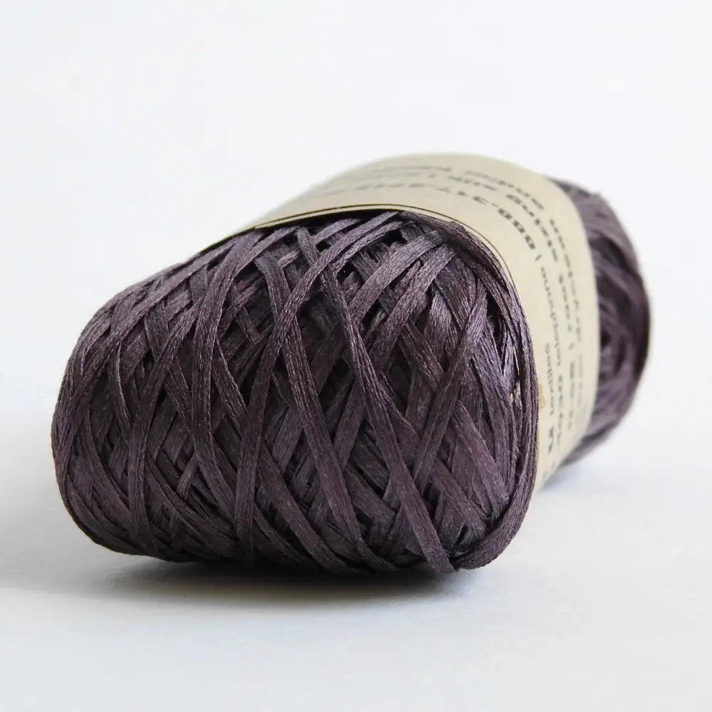 
                  
                    Ball of Habu Silk Tape Yarn in Purple. 100% Japanese silk yarn for knitting, crochet, weaving. Make hats, bags, garments, shawls. Silky and luminous fine tape. Habu Textiles N-6B
                  
                