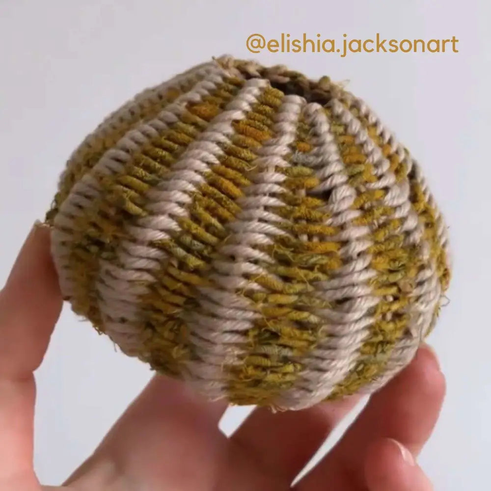
                  
                    Small woven basket incorporating Fairtrade Recycled Sari Twine by @elishia.jacksonart
                  
                