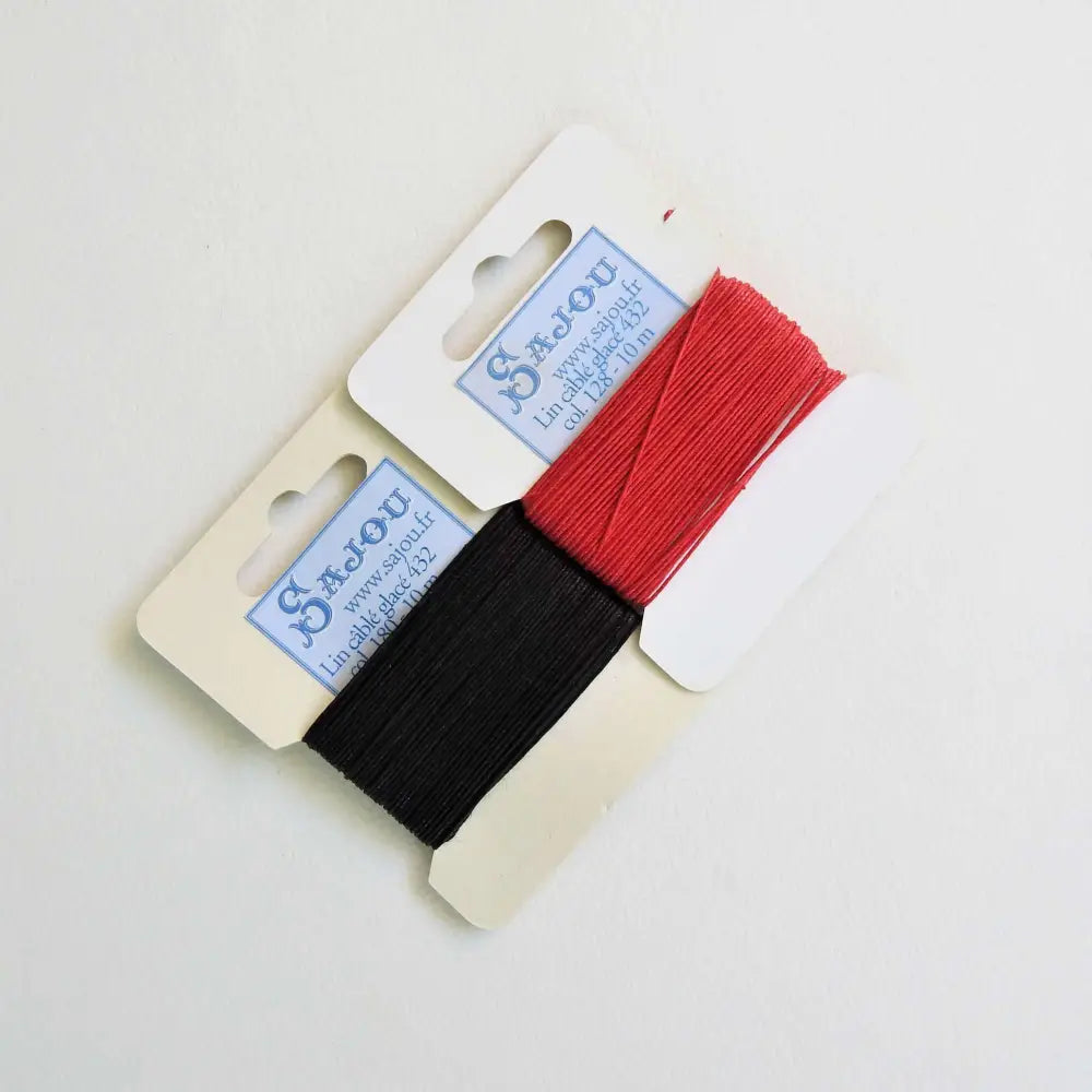 
                  
                    Cards of waxed linen thread in Black and Red.  Wax linen thread for beading, jewellery, leather sewing, book binding, bracelets. Heavy duty thread. Size 432. Fil au Chinois waxed Linen from Maison Sajou. 
                  
                