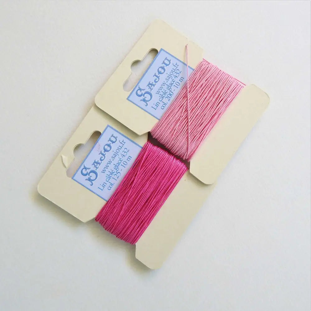 
                  
                    Cards of waxed linen thread in Peony and Bonbon.  Wax linen thread for beading, jewellery, leather sewing, book binding, bracelets. Heavy duty thread. Size 432. Fil au Chinois waxed Linen from Maison Sajou. 
                  
                