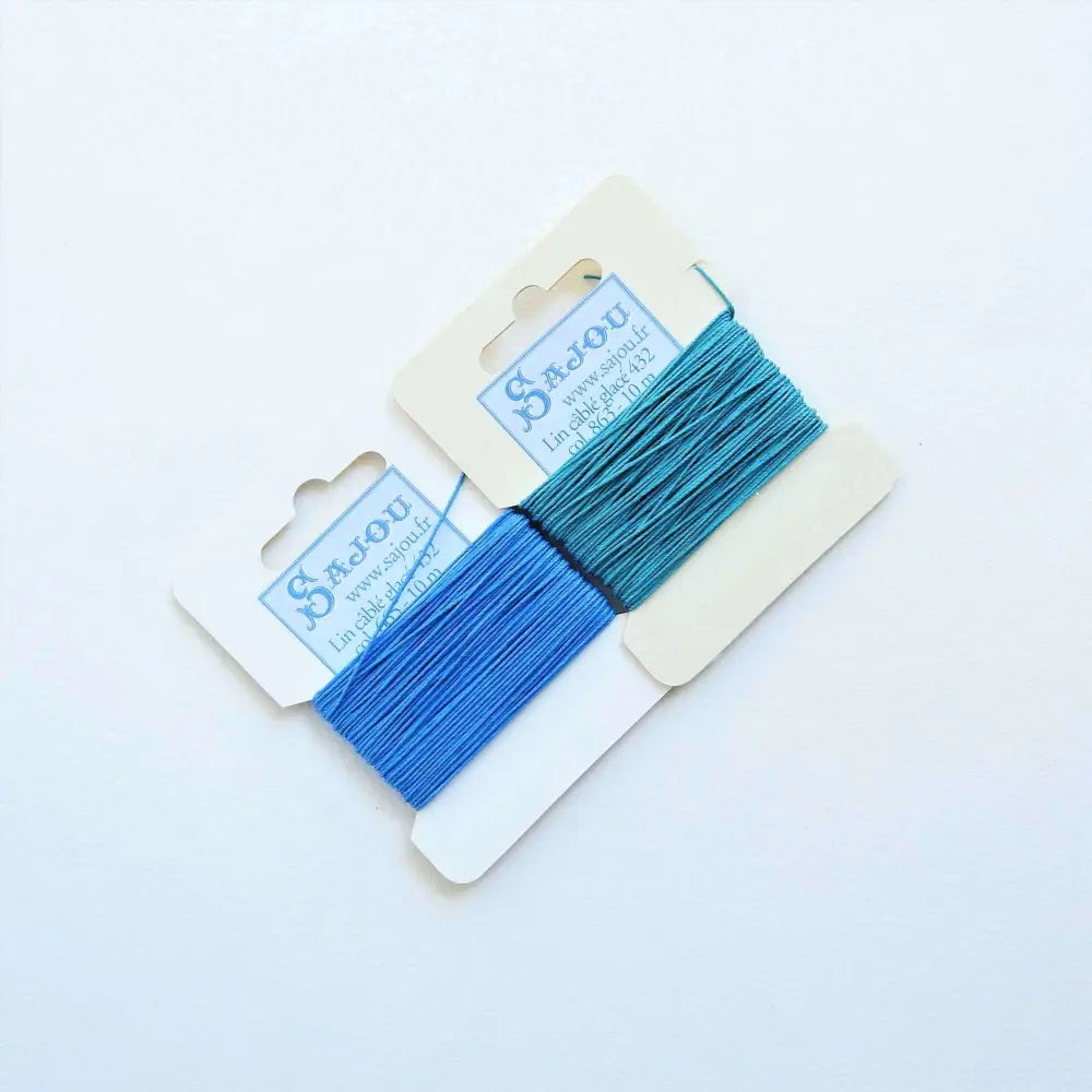
                  
                    Cards of waxed linen thread in Royal Blue and Duck.  Wax linen thread for beading, jewellery, leather sewing, book binding, bracelets. Heavy duty thread. Size 432. Fil au Chinois waxed Linen from Maison Sajou. 
                  
                