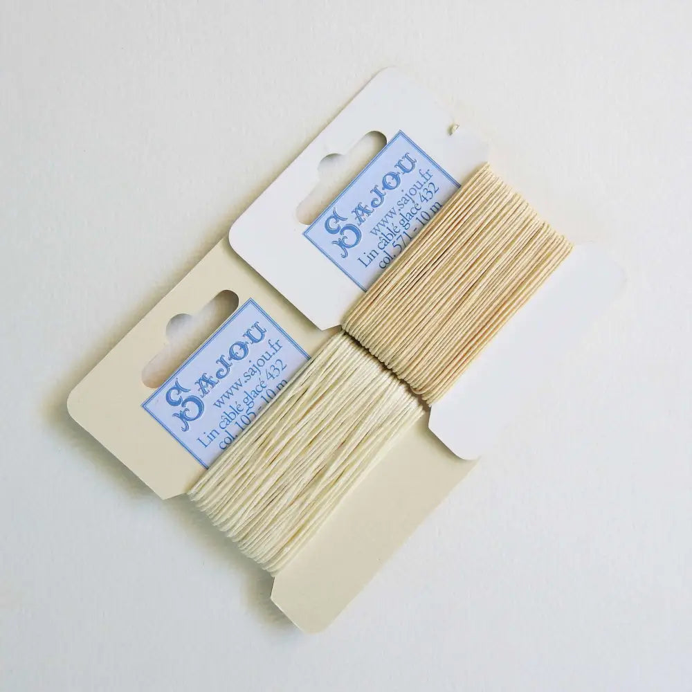
                  
                    Cards of waxed linen thread in Ecru and Natural.  Wax linen thread for beading, jewellery, leather sewing, book binding, bracelets. Heavy duty thread. Size 432. Fil au Chinois waxed Linen from Maison Sajou. 
                  
                