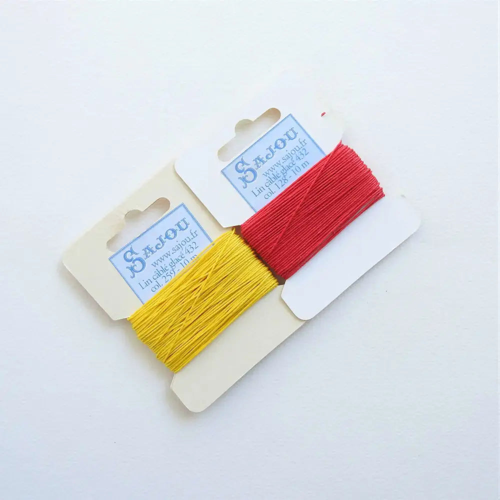 
                  
                    Cards of waxed linen thread in Sunshine and Red.  Wax linen thread for beading, jewellery, leather sewing, book binding, bracelets. Heavy duty thread. Size 432. Fil au Chinois waxed Linen from Maison Sajou. 
                  
                