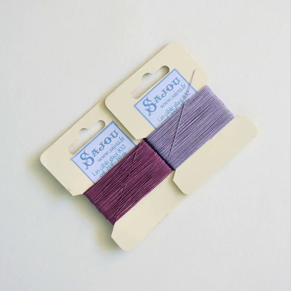 
                  
                    Cards of waxed linen thread in Mauve and Violet.  Wax linen thread for beading, jewellery, leather sewing, book binding, bracelets. Heavy duty thread. Size 832. Fil au Chinois waxed Linen from Maison Sajou. 
                  
                