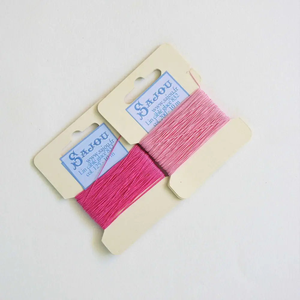 
                  
                    Cards of waxed linen thread in Peony and Bonbon.  Wax linen thread for beading, jewellery, leather sewing, book binding, bracelets. Heavy duty thread. Size 832. Fil au Chinois waxed Linen from Maison Sajou. 
                  
                
